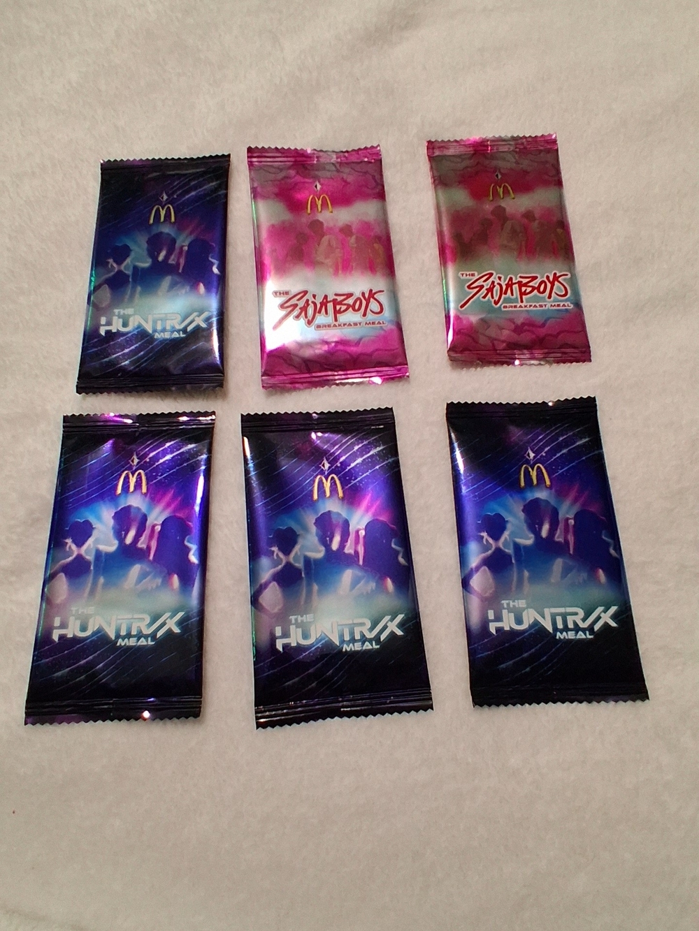 Unopened McDonald's "The Huntrax + SAJABOYS" Promotional Packs - Blue & Pink